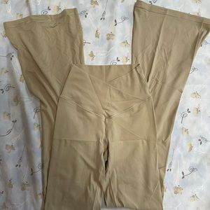 NEVER WORN AERIE LEGGINGS. Flared leggings with cross wais size small.